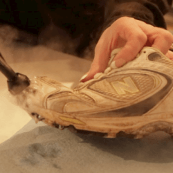 steam cleaner on sneakers