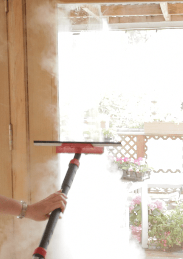 steam cleaner on windows and mirrors